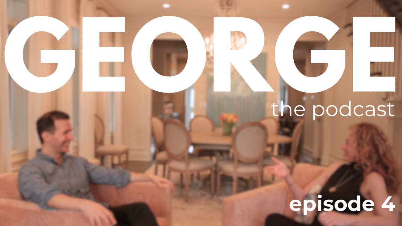 Two people chatting in a cozy, elegant living room setting for a podcast episode.