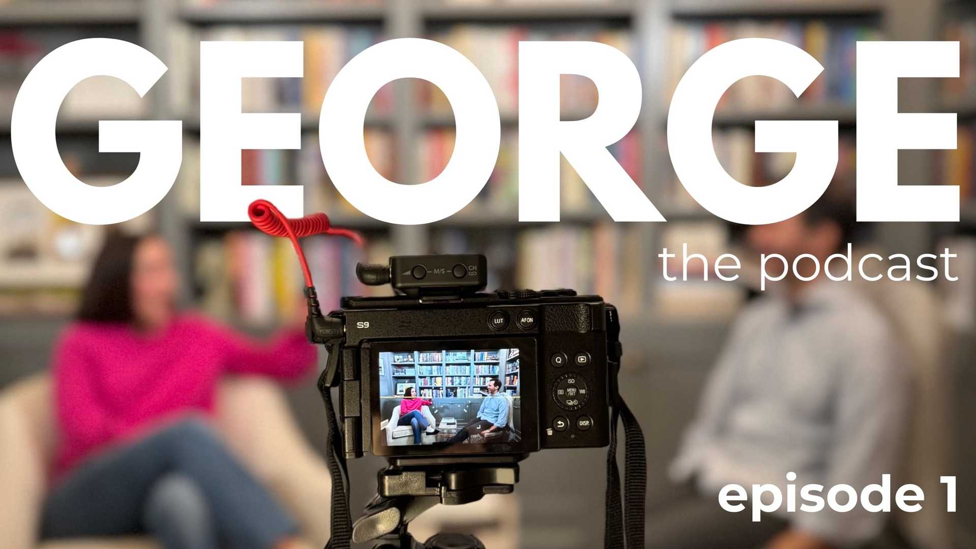 A podcast episode 1 setup with people conversing in a cozy library setting.